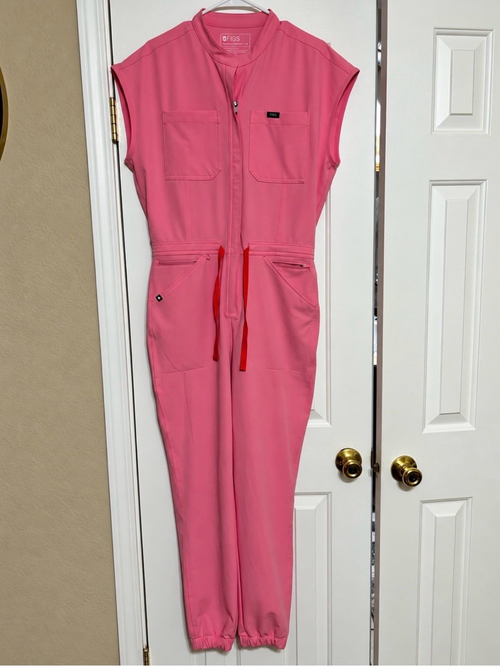 Figs Rafaela cargo jumpsuit in quartz; size M. Breast cancer awareness